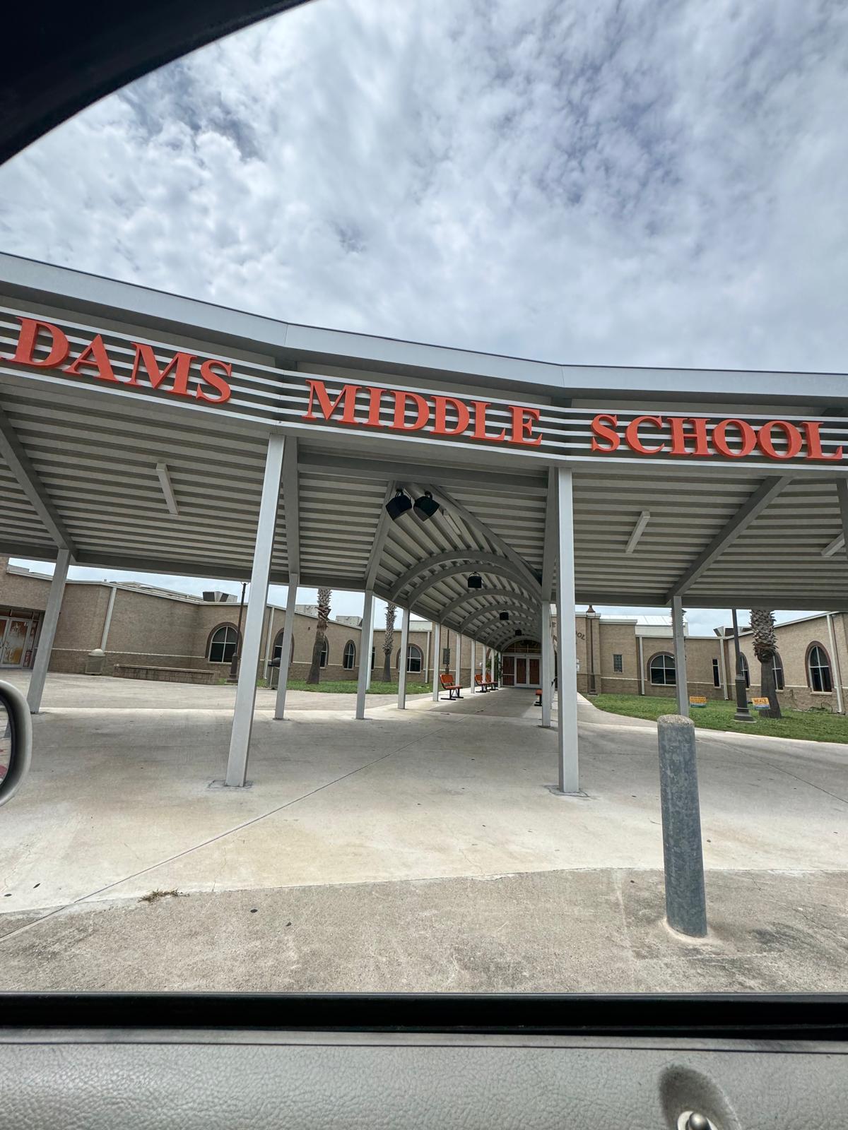 Adams Middle School exterior entry canopy where covered walkway PA system was installed by ValleyScoreboards